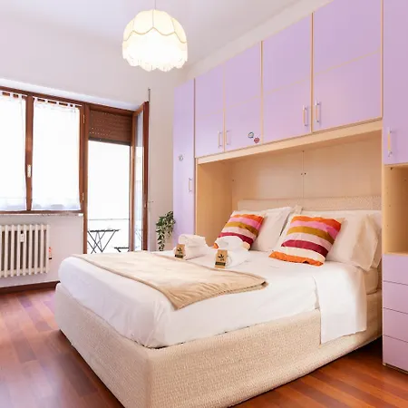 Residenza Esclusiva con 2 Suite, 2 Bagni, Balcone con Vista e Area Fitness nel Cuore della Città